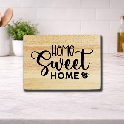 Engraved cutting board with the phrase 'home sweet home' beautifully designed for kitchen use.