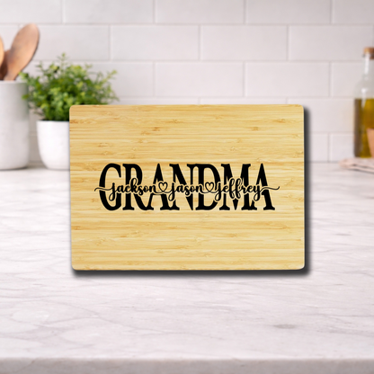 Personalized Mother’s Day Cutting Board engraved with names, perfect gift for mom or grandma.