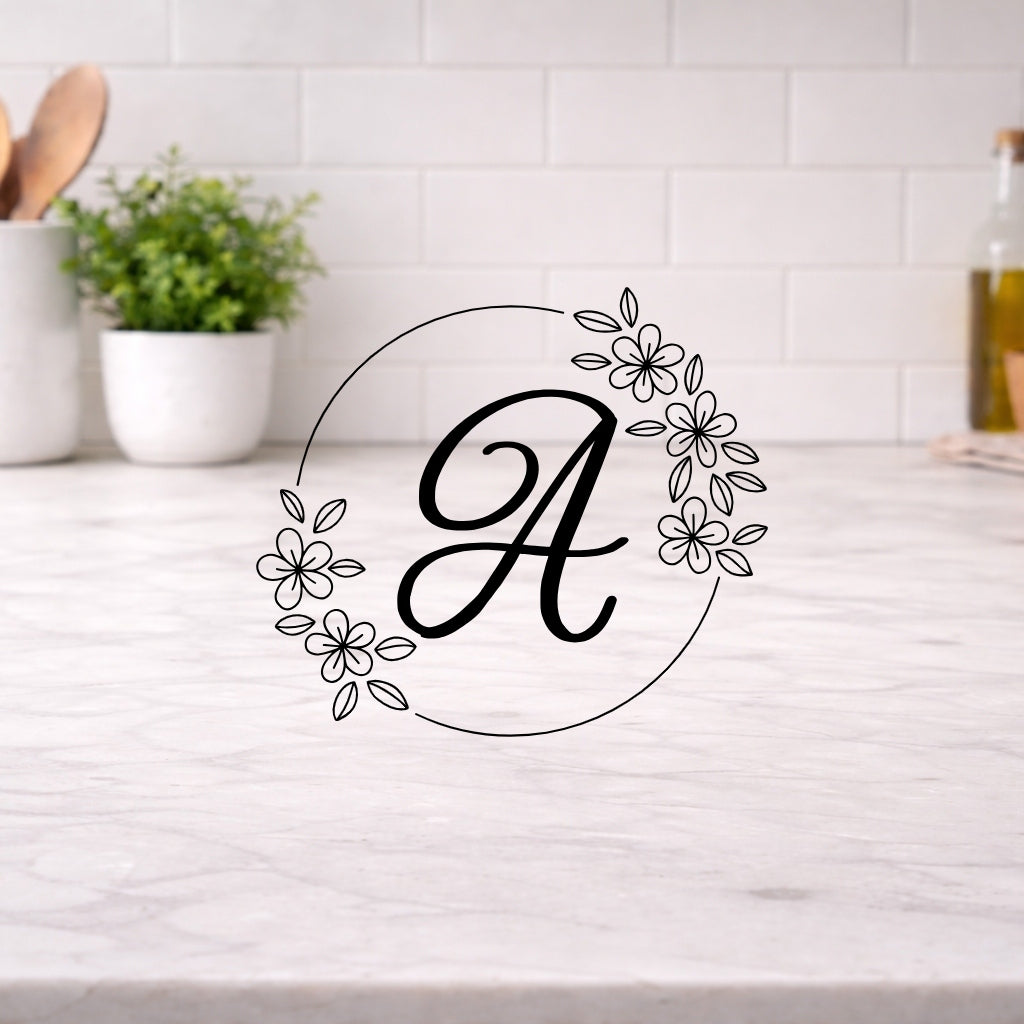 Engraved Cutting Board with Custom Monogram displayed on a kitchen countertop, featuring an elegant initial design