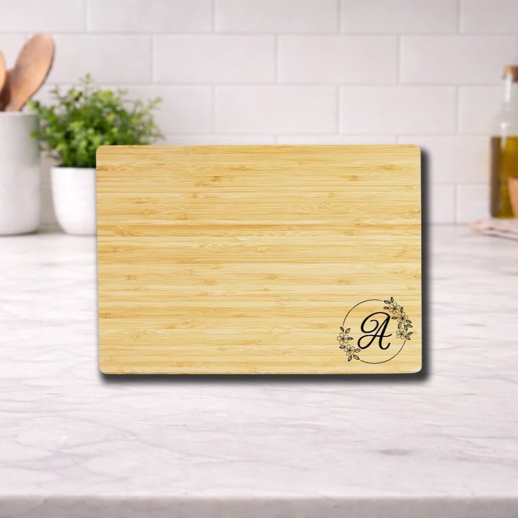 Personalized Engraved Monogram Cutting Board — Floral Design featuring an elegant 'A' in floral design. Rubberwood